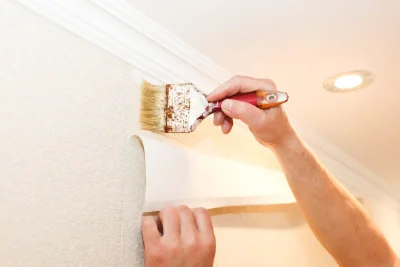 Pose de papier peint à la Dominelais — revêtements muraux et toiles de verre